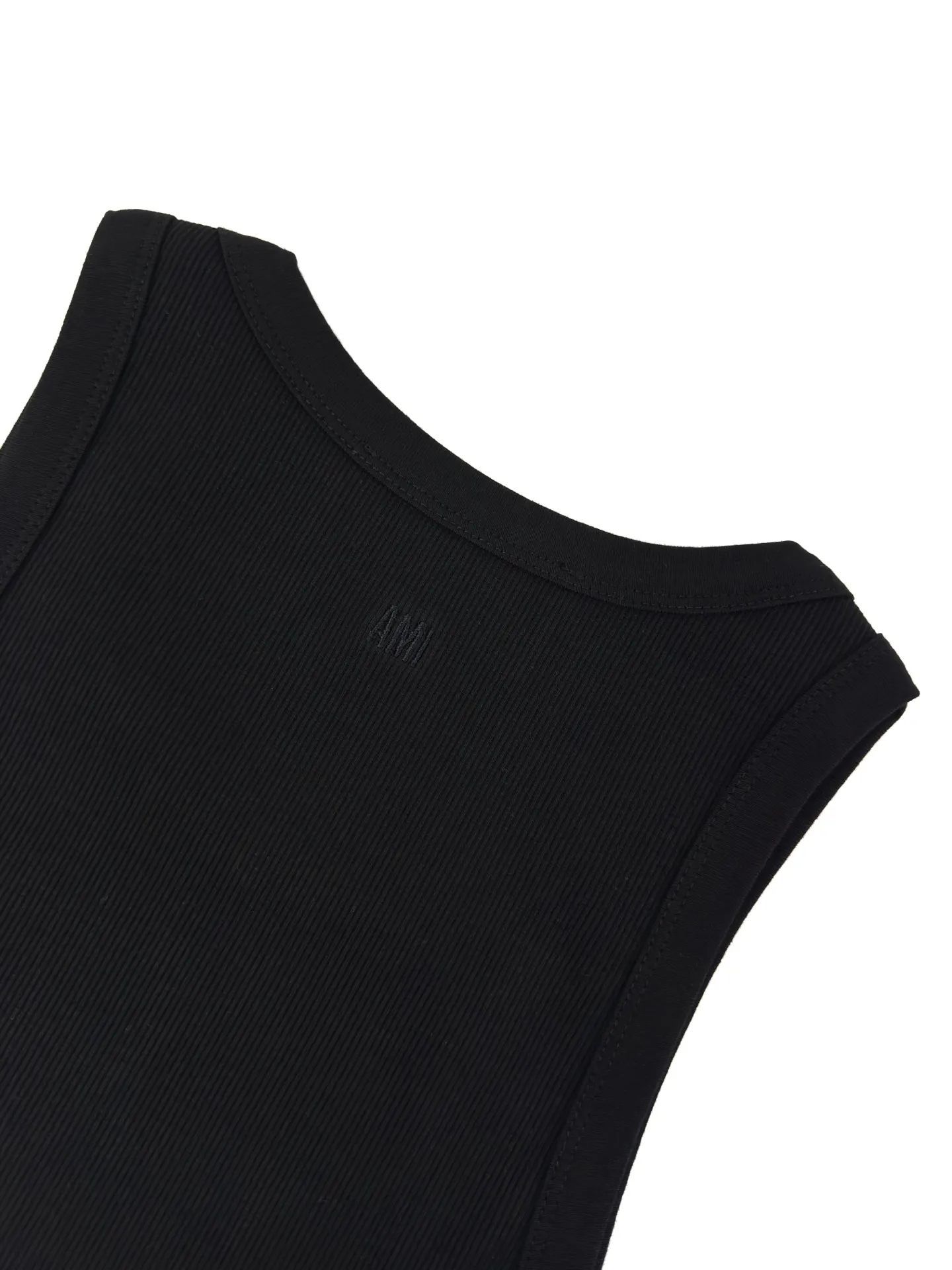 Logo embroidered vest Customized luxurious and soft plain cotton, cloudy and skin-friendly, clean and refreshing Breathable, simple black tones embody French sophistication, showing a luxurious style when relaxed. Love logo lightly embroidered on the front, Ami embroidery on the back neck with dark engraved texture, French attitude on both sides, minimalist and quality, interior with hidden charm, easy to wear alone, Versatile is elegant and effortless. Process 1: Using imported machine embroidery technology Use advanced computer control systems and precision mechanical components to achieve Ami logo and letter embroidery operations with high precision and smooth and delicate lines. Process 2: The fabrics have been fermented and washed for a better hand feel. Not easy to deform, not easy to shrink, not easy to fade, and maintain long-term beauty. Accessories: Customized 1:1 Ami trademark. Version: Fitted version. Size: S M L XL. Style number: AA 603.